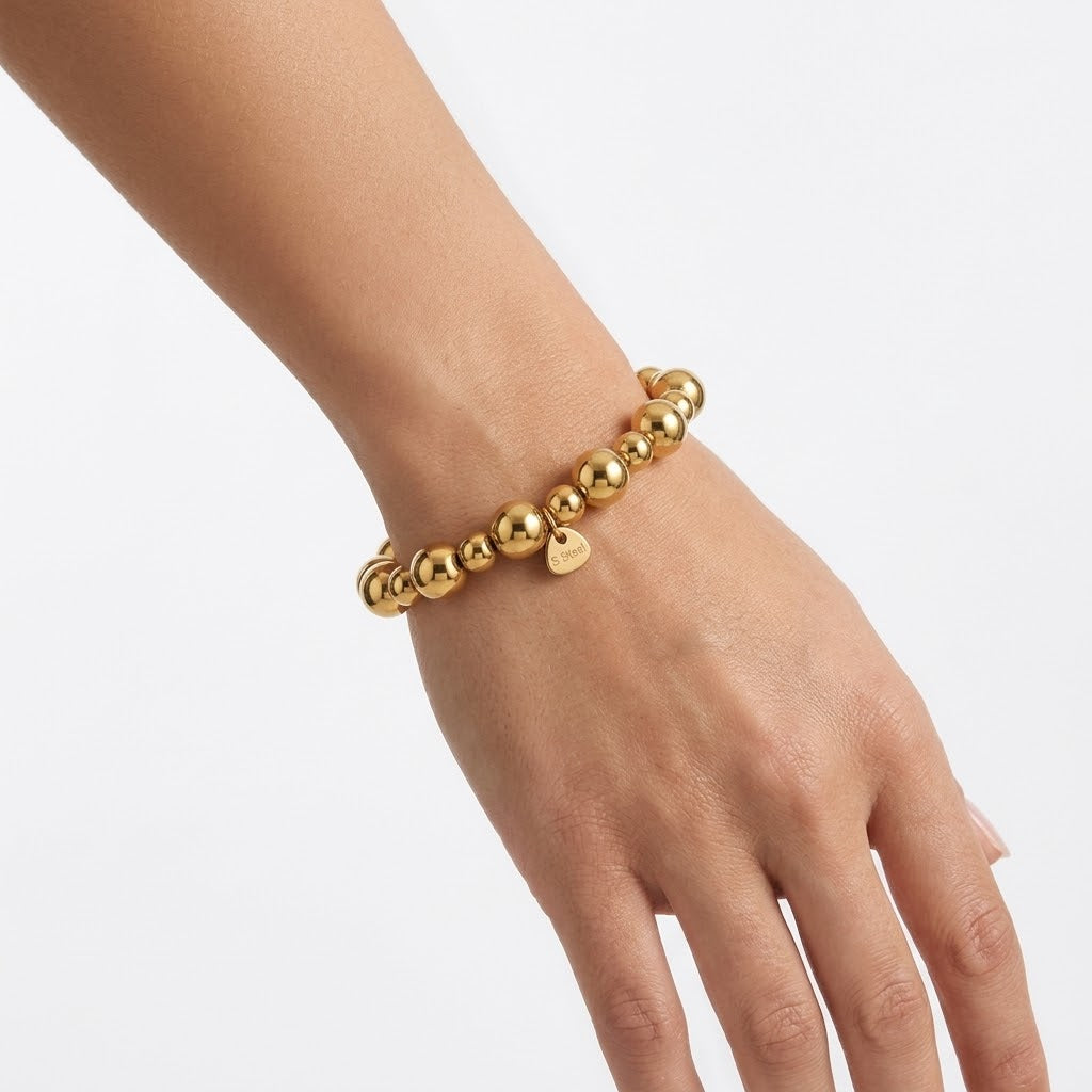 Pulsera  cuentas doradas